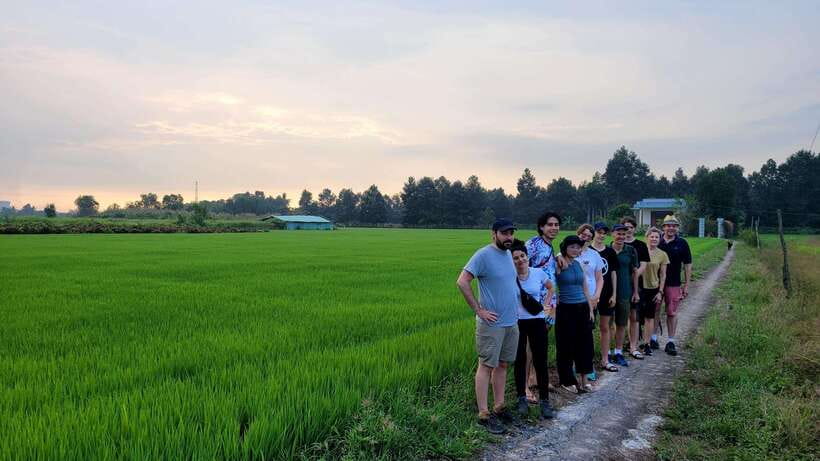 Ho Chi Minh City: 2-Day Bike & Kayak Mekong Delta Tour - Vinh Trang Pagoda and the busy river afternoon