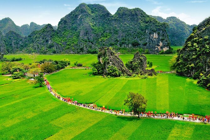 Hoa Lu - Tam Coc - Ninh Binh Day Tour: Biking, Visit Local Family - Rowing through Tam Coc’s limestone country