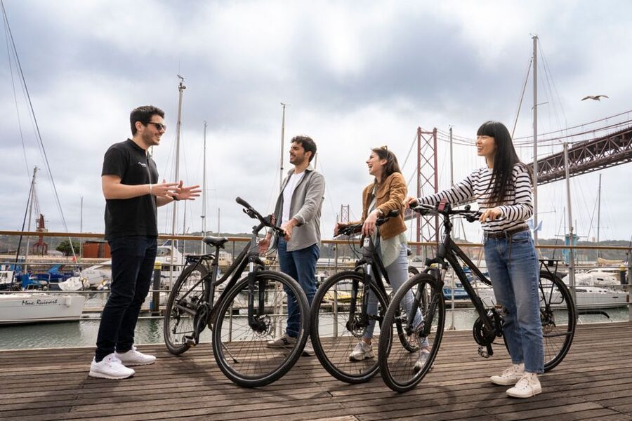 Lisbon: Guided Bike Tour, Helicopter Flight, and Boat Trip - Ten minutes over Lisbon by helicopter