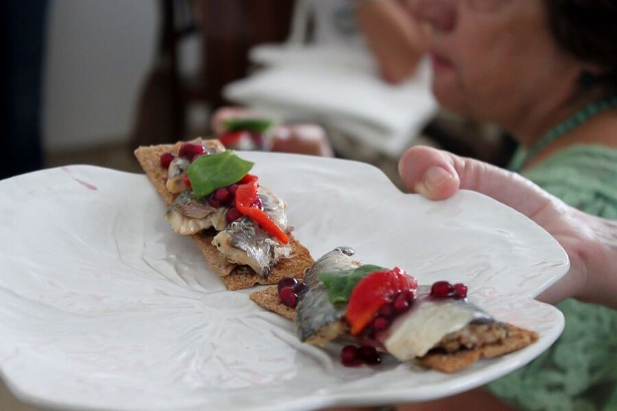 Lisbon: Portuguese Petiscos Tasting Tour by E-Bike - Pink Street and the lower waterfront