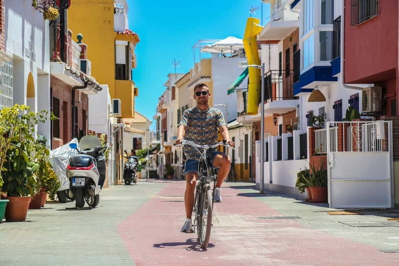Malaga: Castle Hill and Fisherman Village E-Bike Tour - Street art and the changing parts of the city