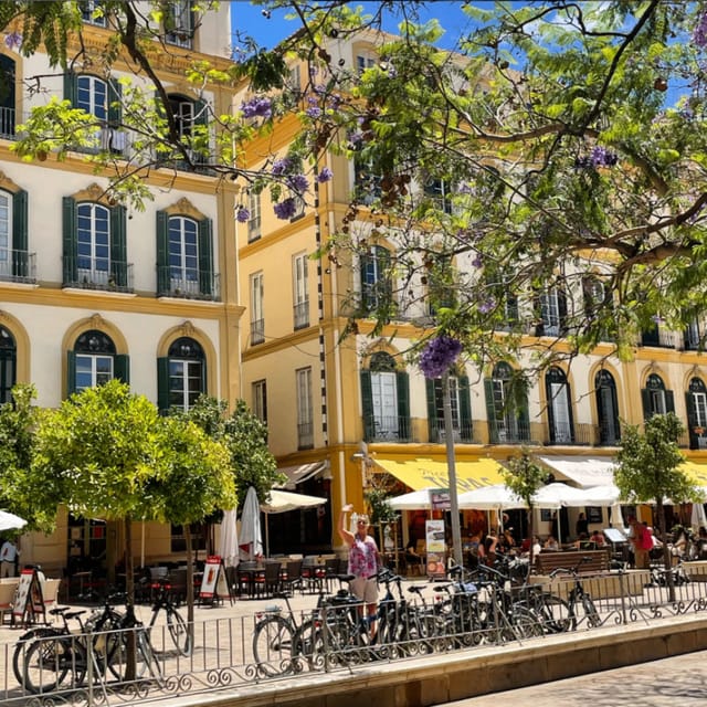 Malaga: Castle Hill and Fisherman Village E-Bike Tour - Riding the beach promenade to Miramar Palace