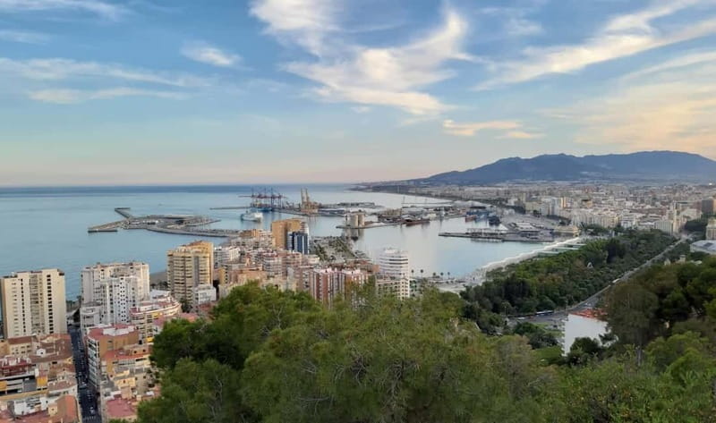 Malaga: Castle Hill and Fisherman Village E-Bike Tour - Starting through Málaga’s historic center