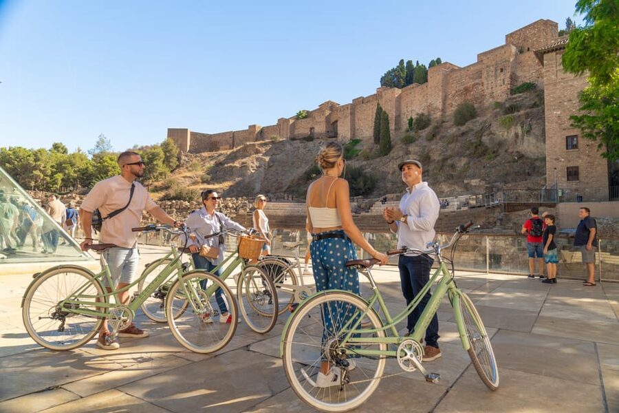 Málaga: Highlights, Hidden Gems and Coast Vintage Bike Tour - Plaza de la Merced and the first taste of old Málaga