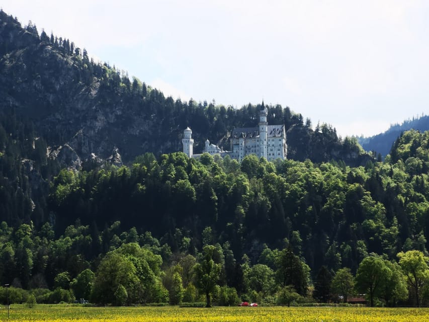 Munich: Neuschwanstein Castle by Bus with Alpine Bike Ride - Walking up to the fairytale castle