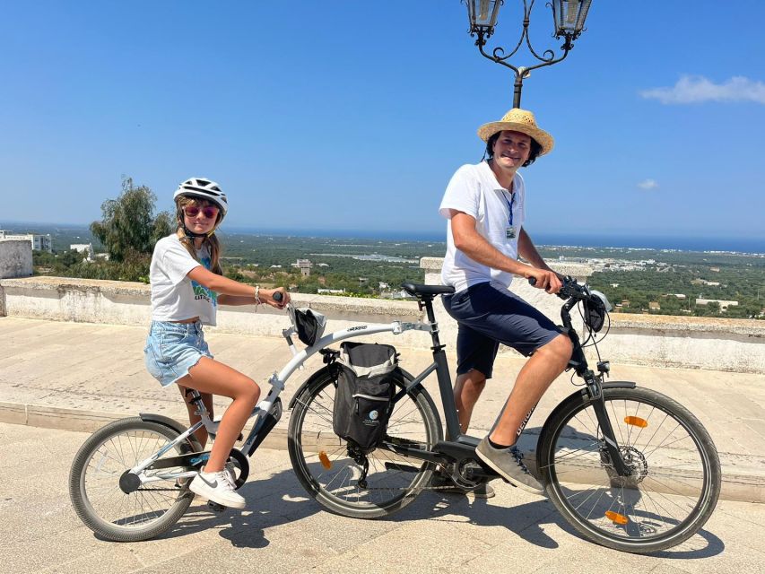 Ostuni: Guided e-bike tour + countryside tasting stop - Riding through the olive groves