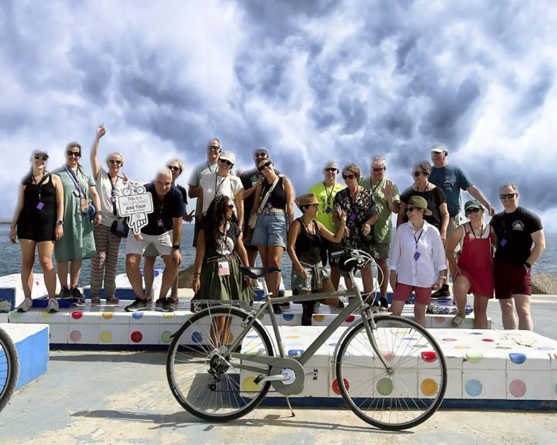 Palermo: Guided Bike Tour with Street Food Tasting - The giant Moreton Bay fig at Piazza Marina