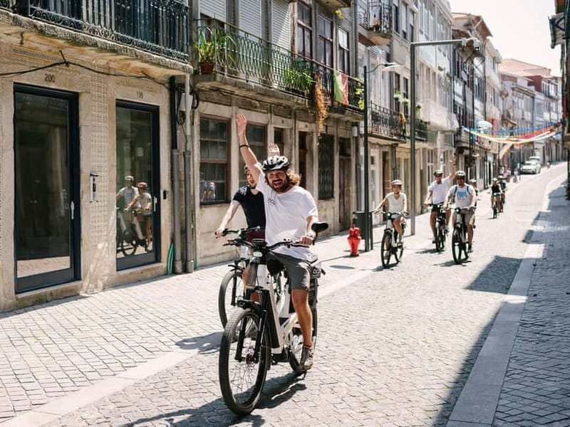 Porto: Highlights in 3 Hours E-Bike Tour - Aliados and Clérigos: the city’s grand center
