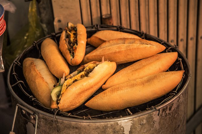 Private Hoi An Evening Food Tastings Tour by Bike - What the guide adds to the evening