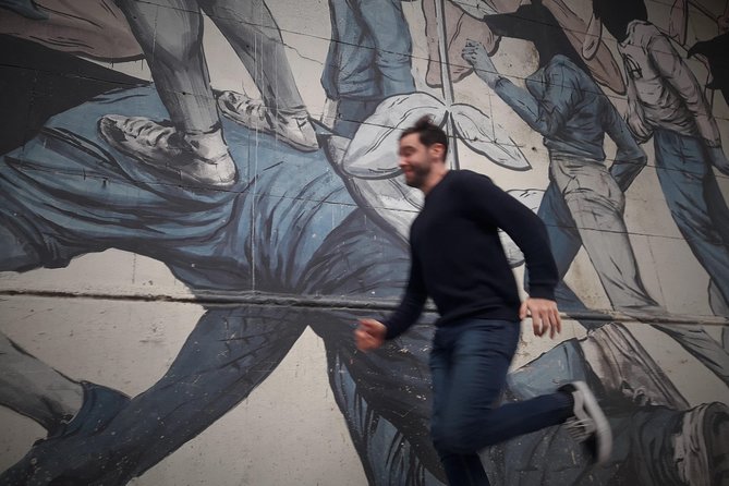 Private Off the Beaten Path: Hidden Urban Art Bike Tour - Entering La Boca beyond the postcard version