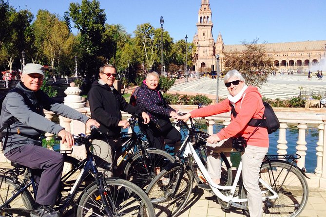 Seville Bike Tour with Full Day Bike Rental - Crossing toward Triana and the Guadalquivir