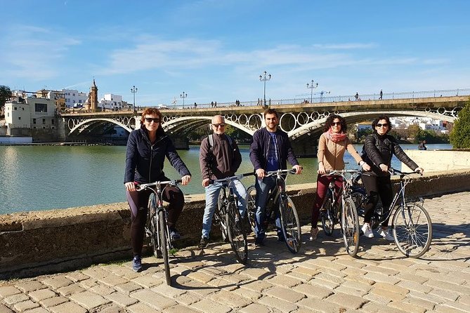 Seville Bike Tour with Full Day Bike Rental - What the guides add to the ride