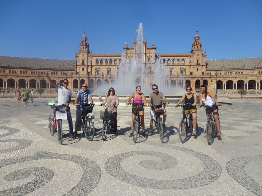 Seville: Electric Bike Tour in Small Group - Crossing into Triana