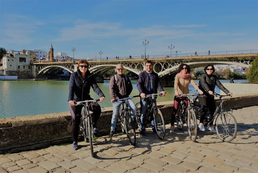 Seville: Highlights Bike Tour with Local Guide - Cartuja, Magellan, and the riverfront