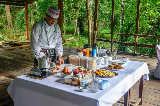 Siem Reap: Angkor Wat Sunrise Bike Tour & Jungle Breakfast - Ta Prohm, where trees take over the ruins