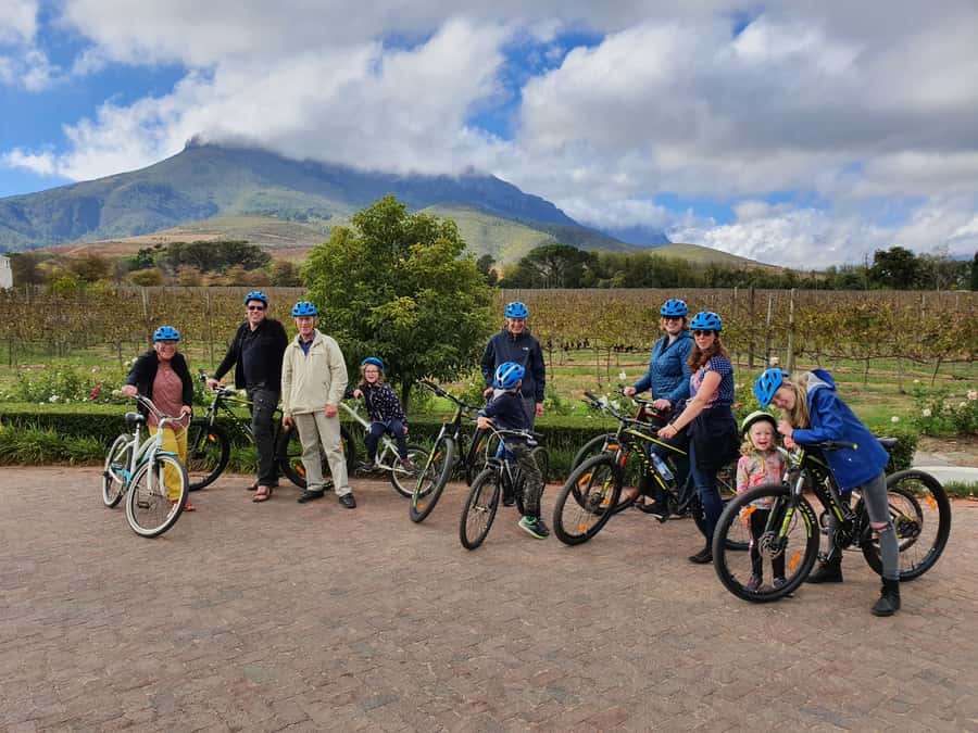 Stellenbosch: Historical Bike Tour & Wine Tasting - Riding through Stellenbosch University and toward Jonkershoek